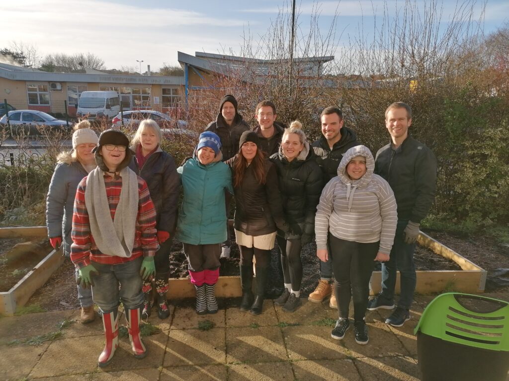 B&Q volunteers and CRUMBS trainees and staff in the Community Kitchen Garden outside CRUMBS' training centre in Bournemouth. 