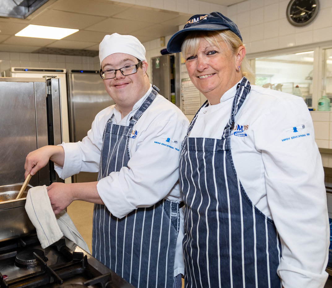 CRUMBS trainees in the kitchen preparing food