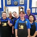 Trainees and staff from The Crumbs Project join students and staff at The Cafe Project Basingstoke