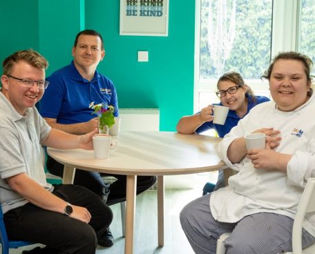 A group of trainees sitting at a table